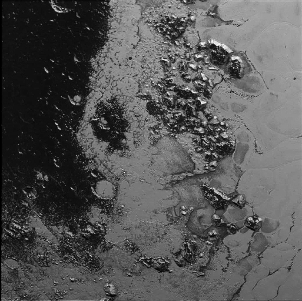 A second mountain range on Pluto that rises from the dwarf planet&#039;s heart-shaped region, nicknamed Tombaugh Regio, is seen in this stunning image from NASA&#039;s New Horizons spacecraft. NASA unveiled the image on July 21, 2015.