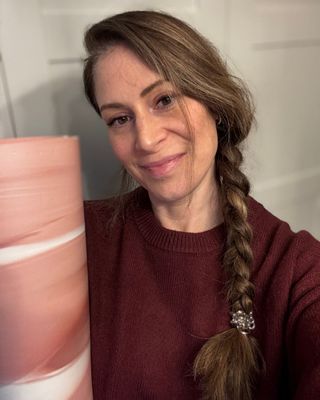 Health writer Anna during her Pilates shoulder bridge challenge