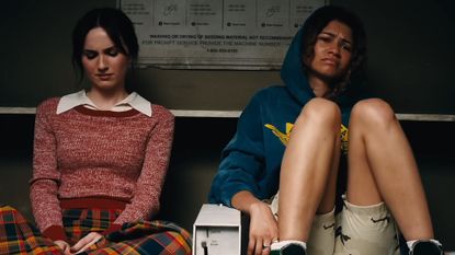 Lexi (Maude Apatow) and Rue (Zendaya) looking very sad in a laundromat