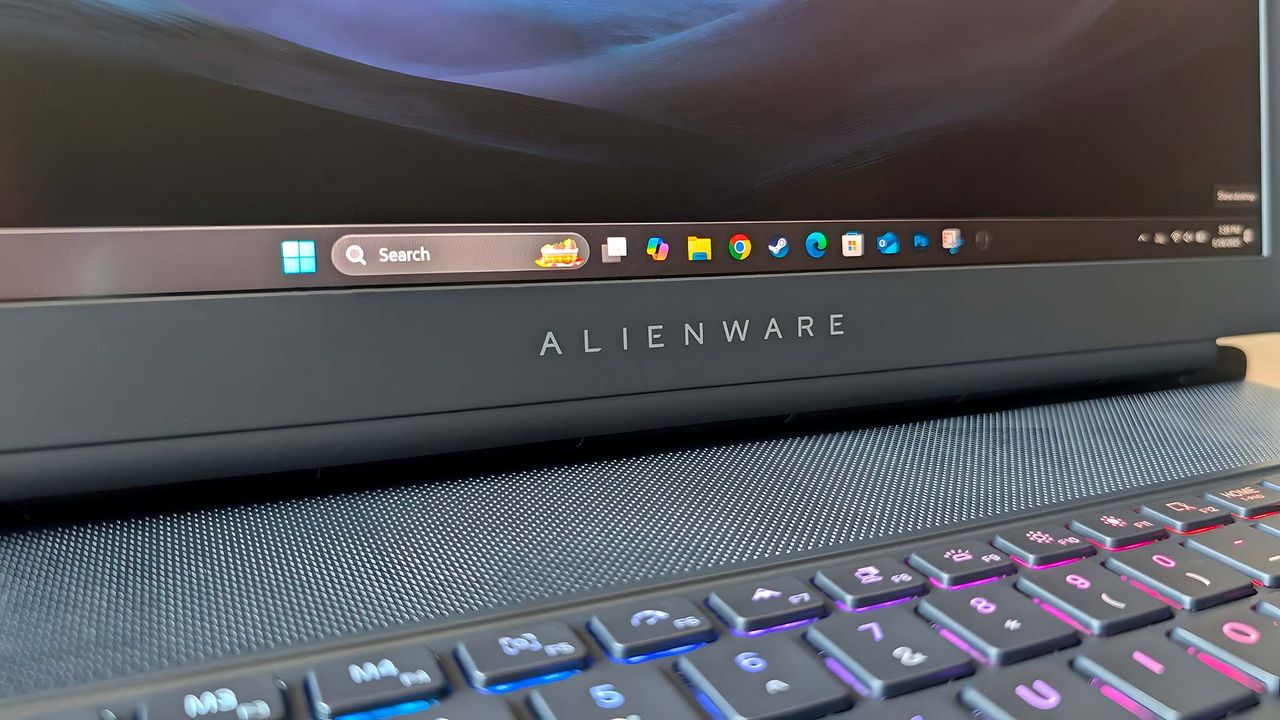Closeup of the Alienware logo on the Alienware Area-51 16 Gaming Laptop.