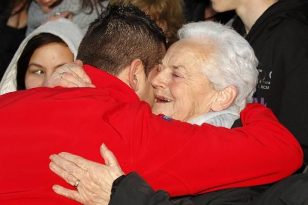 Superprestige Gavere champion Kevin Pauwels gets a hug from his grandmother.