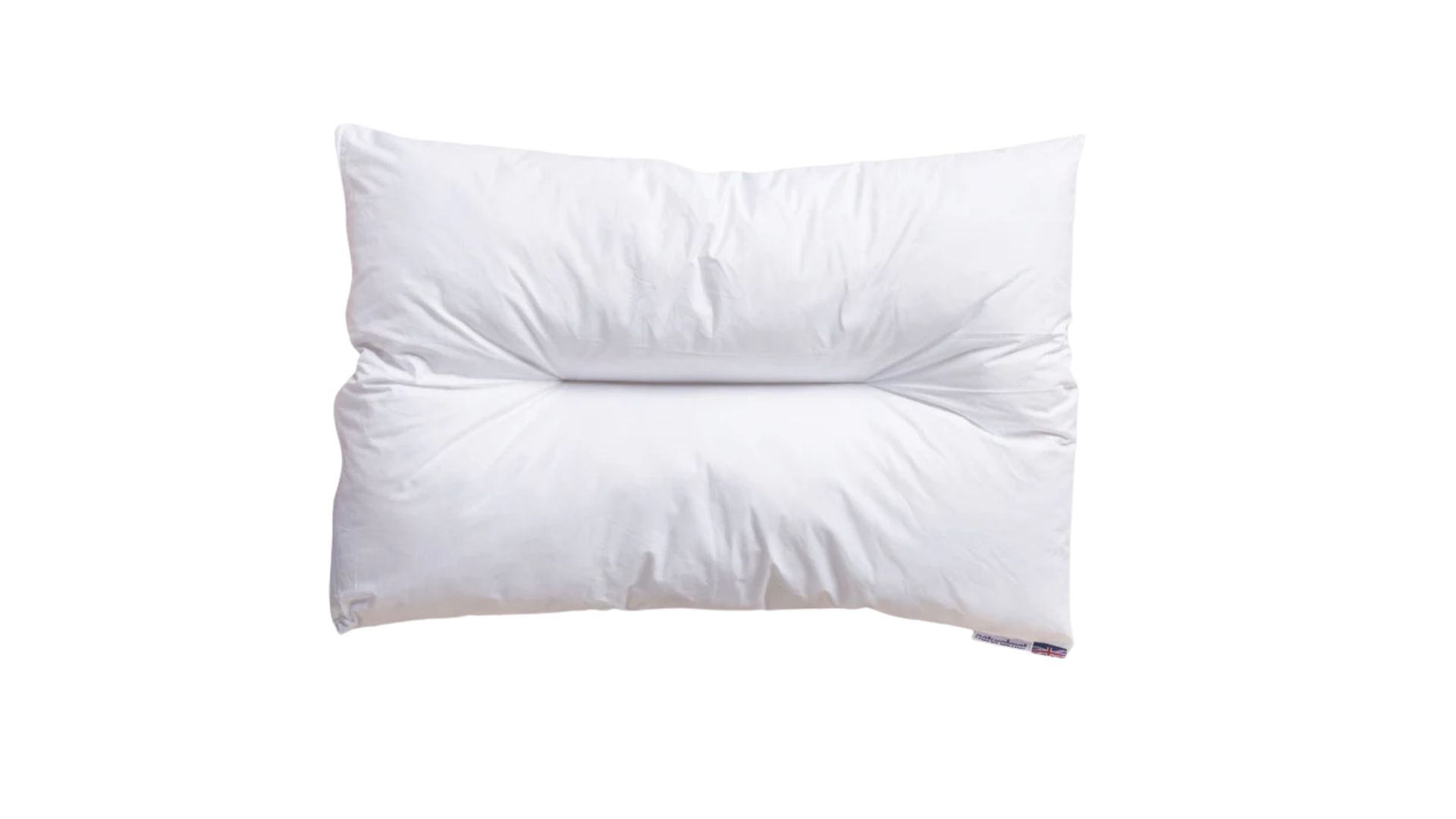 The Naturalmat The Centre Stitched Wool Pillow on a bed