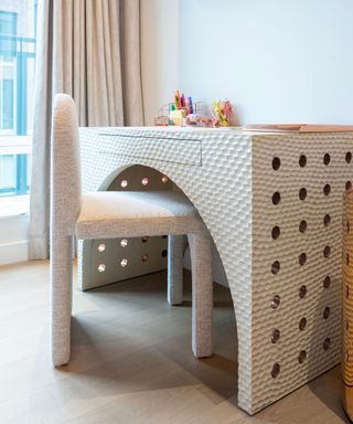 A textured desk in a kids' room