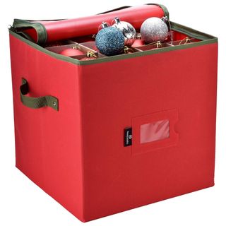 A red ornament storage bag filled with baubles