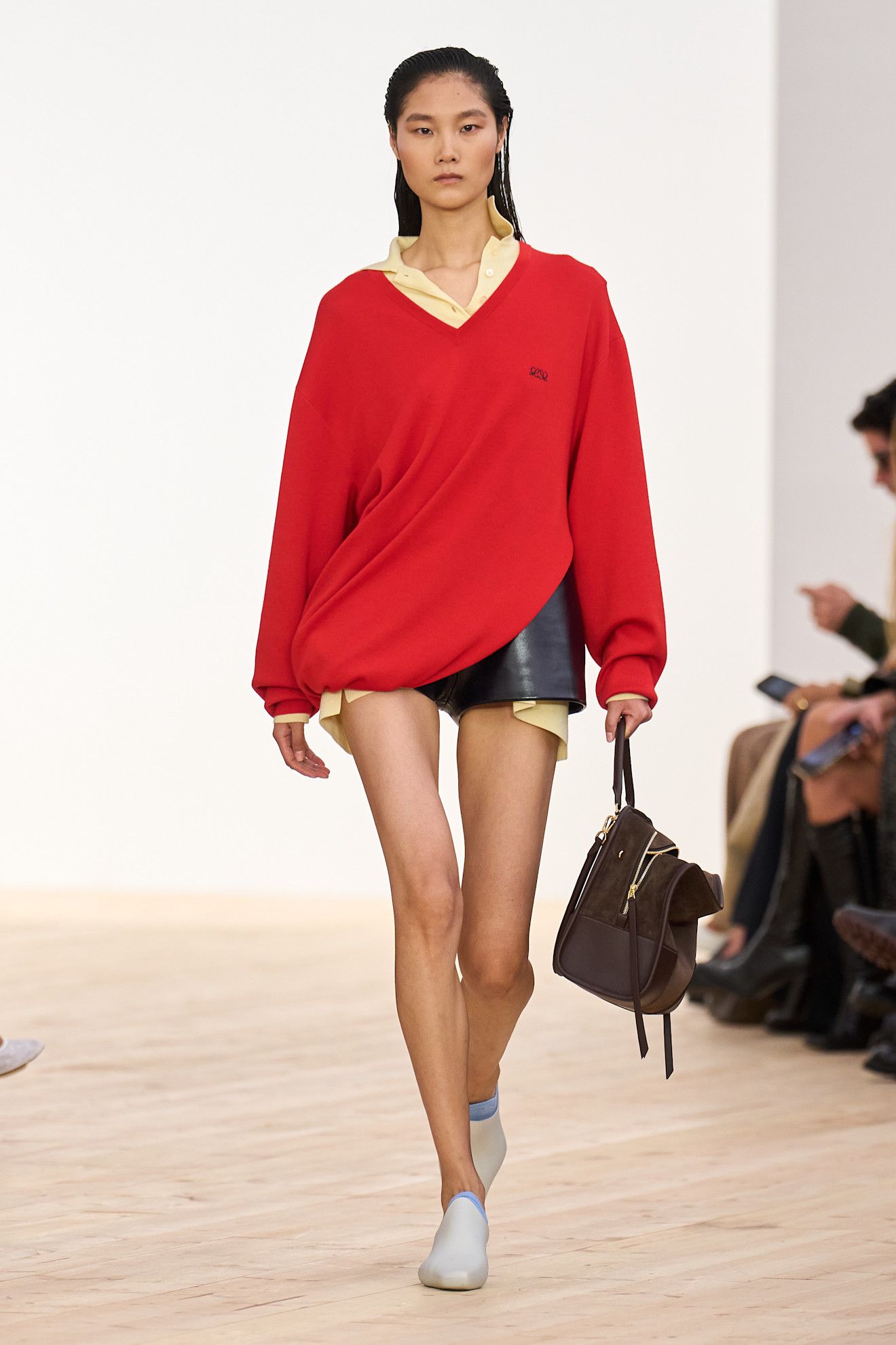 An image of the poppy colour trend on the Loewe Spring/Summer 2026 runway.