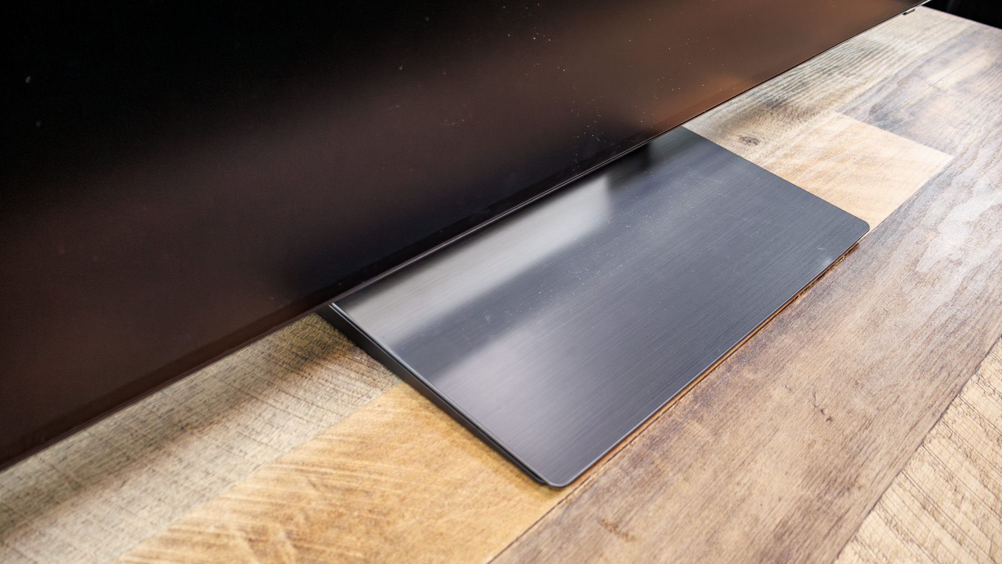 The pedestal of a Samsung OLED S90H 4K TV