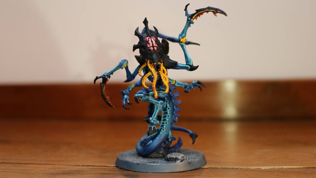 New Tyranid Neurolictor model on a wooden table