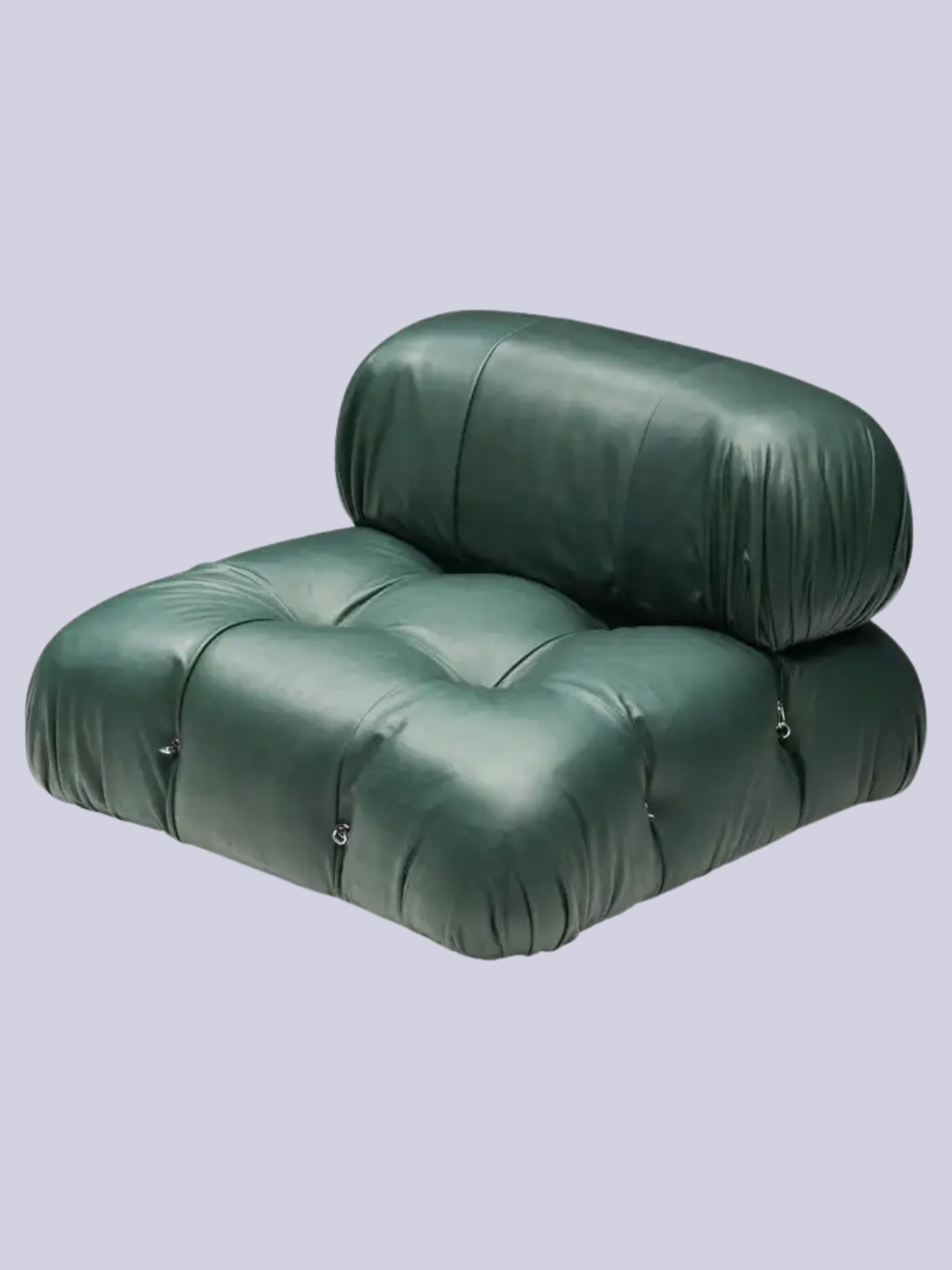 A green leather sofa by Mario Bellini for Bellis