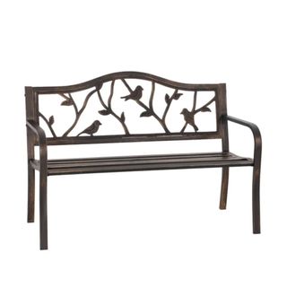 A dark brown metal bench with a bird and branch pattern on the back