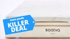 The Saatva Graphite Memory Foam Mattress Topper with deal label