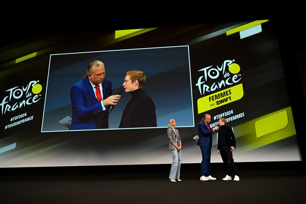 PARIS FRANCE OCTOBER 25 LR Demi Vollering of The Netherlands and Team SD Worx and Jonas Vingegaard of Denmark and Team JumboVisma during the 111th Tour de France 2024 3rd Tour de France Femmes 2024 Route Presentation UCIWT UCIWWT on October 25 2023 in Paris France Photo by Dario BelingheriGetty Images