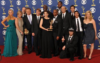 Cast and crew from the TV show "30 Rock" in the press room after the show won the Best Comedy series award, during the 2009 Emmy Awards