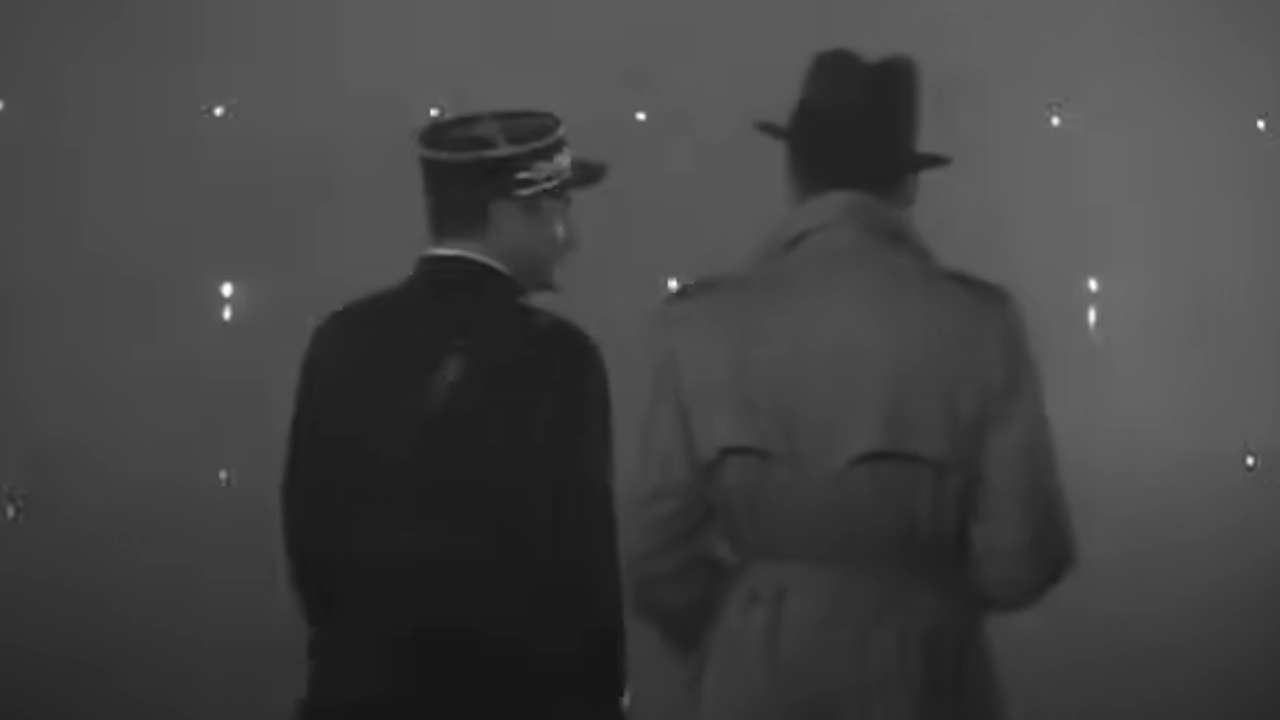 Claude Rains on the left, walking away from the camera with Humphrey Bogart in Casablanca