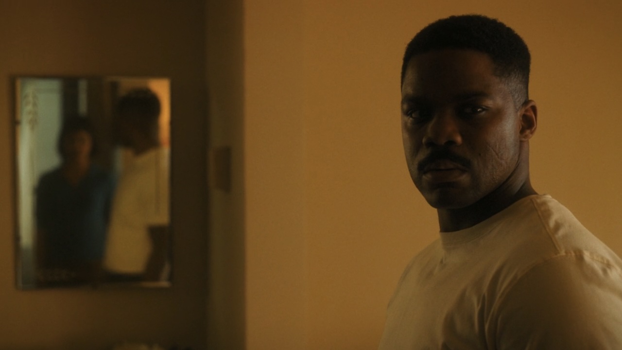 Leroy looking at Charlotte with mirror in the background in IT: Welcome To Derry Episode 6