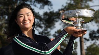 Rose Zhang of the United States celebrates with the trophy after winning in a playoff during the final round of the Augusta National Women's Amateur at Augusta National Golf Club on April 01, 2023