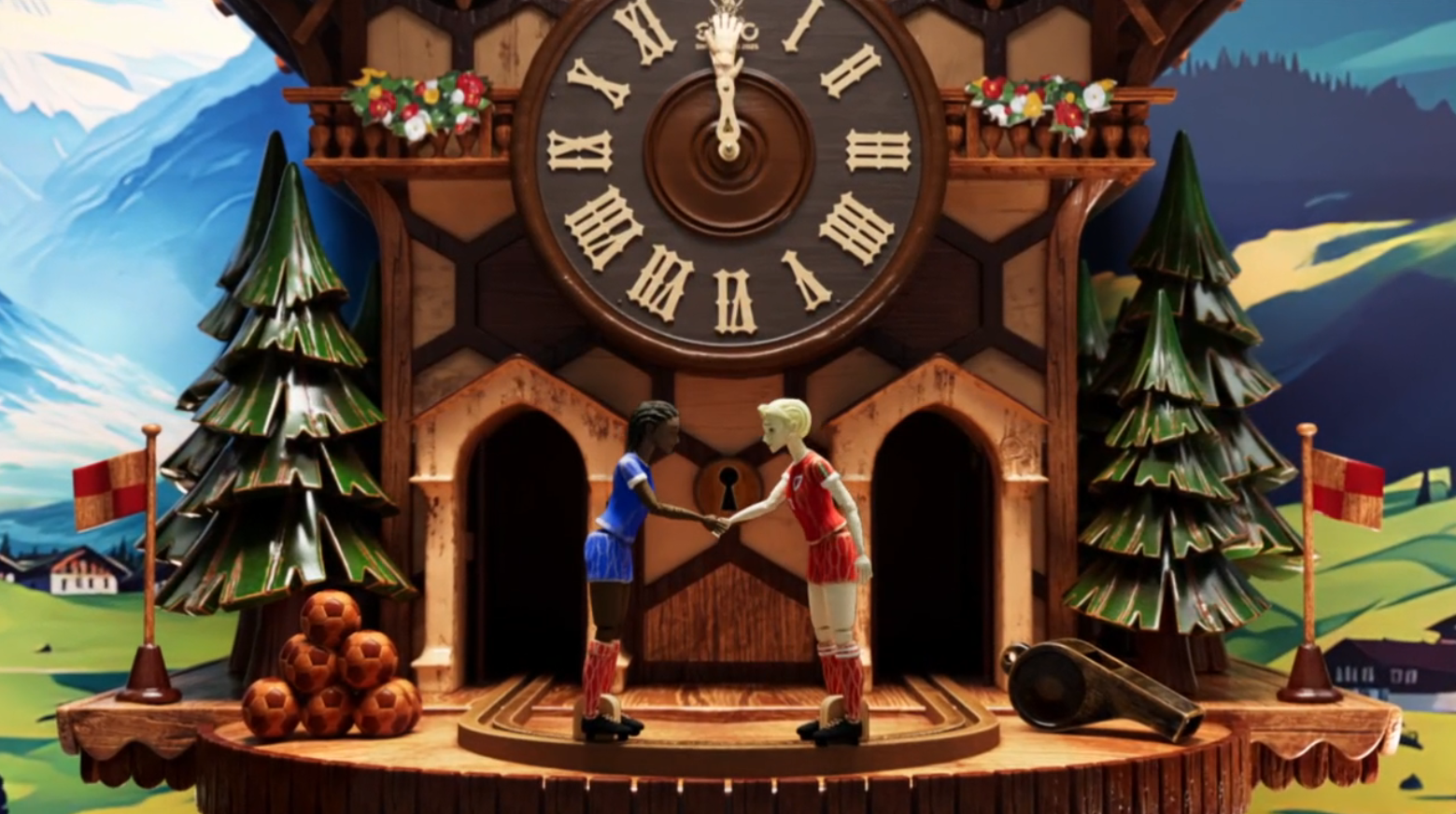 Screenshot of ITV&#039;s Euro 2025 opening sequence, showing wooden France and Wales players shaking hands as part of a cuckoo clock