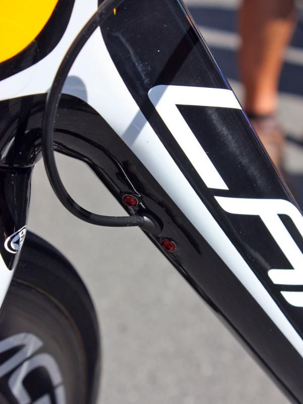 The control wire for the Francaise des Jeux team's Shimano Dura-Ace Di2 transmission is fed into the frame on the underside of the down tube.