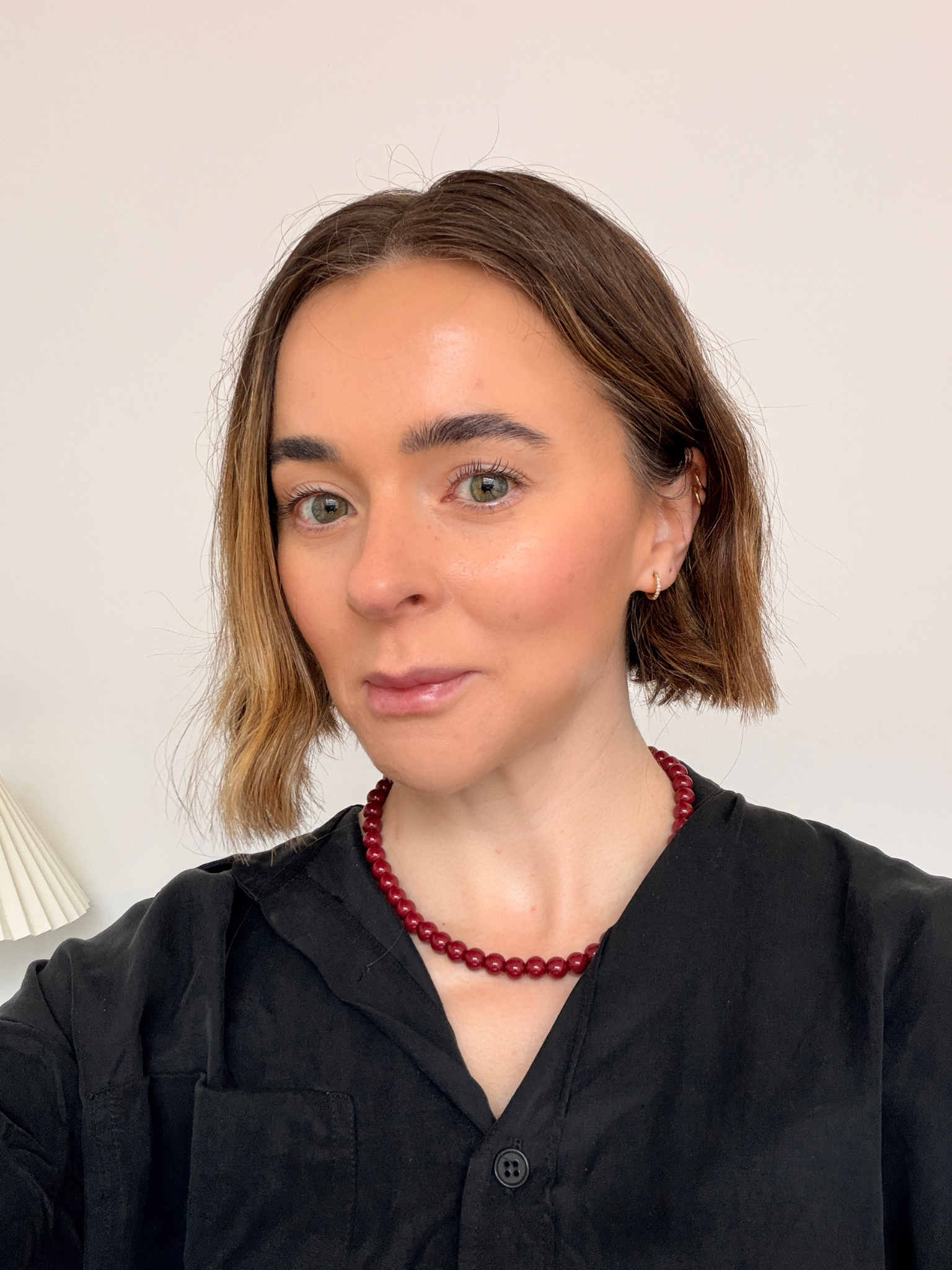 Grace wearing Fenty Beauty Eaze Drop Blurring Skin Tint