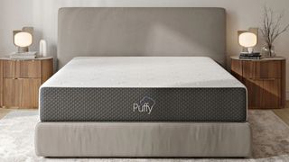 Best memory foam mattress: the Puffy mattress placed on a light grey bed frame