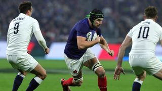 Francois Cros of France take son Alex Mitchell and George Ford during England vs France in the 2024 Six Nations