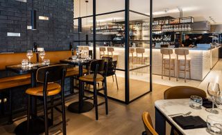 Leicester Square Kitchen with brick wall and bar counter