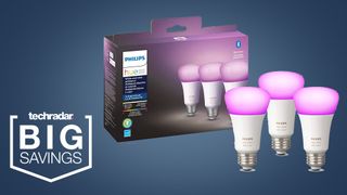 Philips Hue White and Color Ambiance bulbs with packaging on a blue background