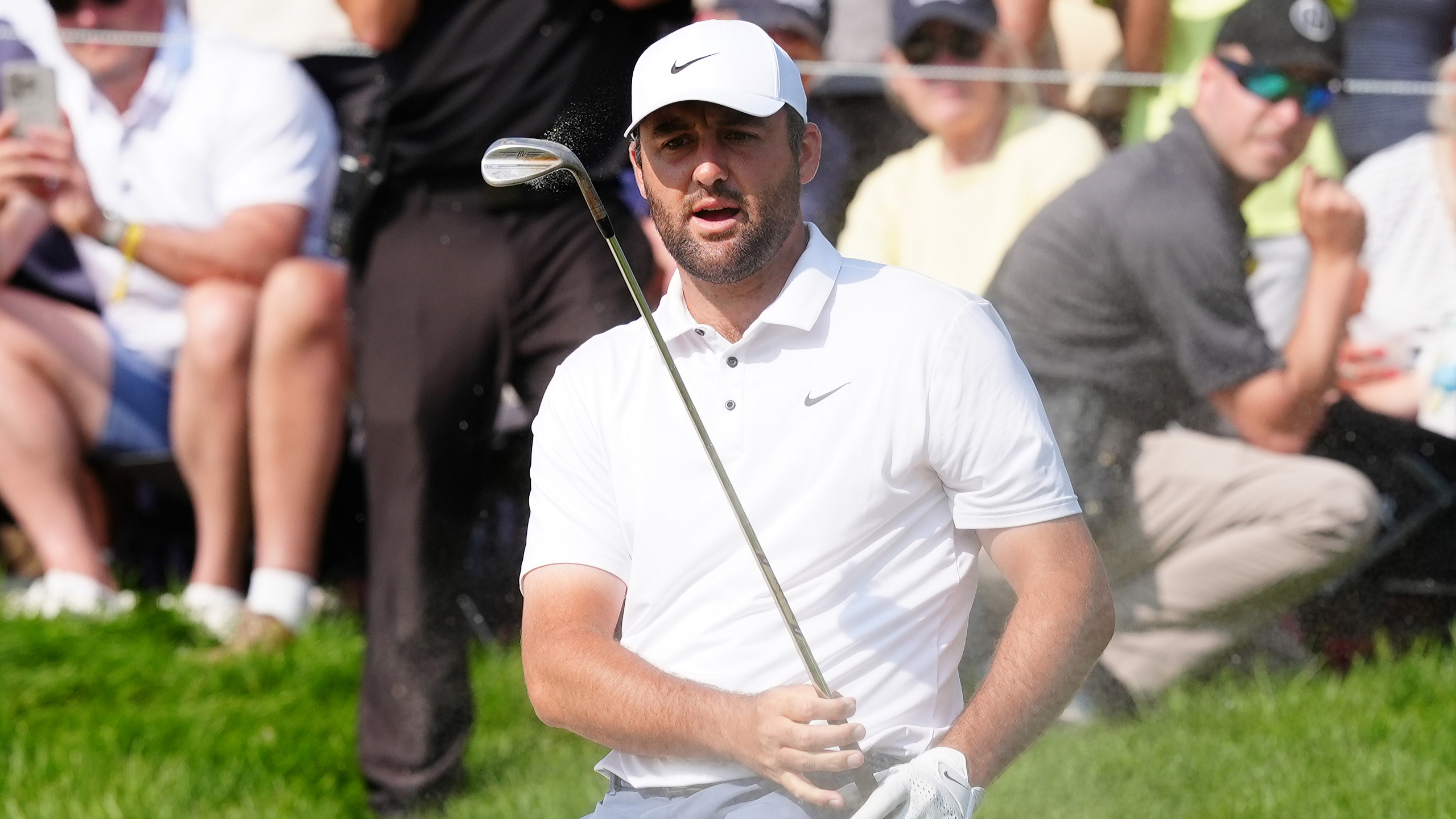 Photo of Scottie Scheffler hitting a wedge