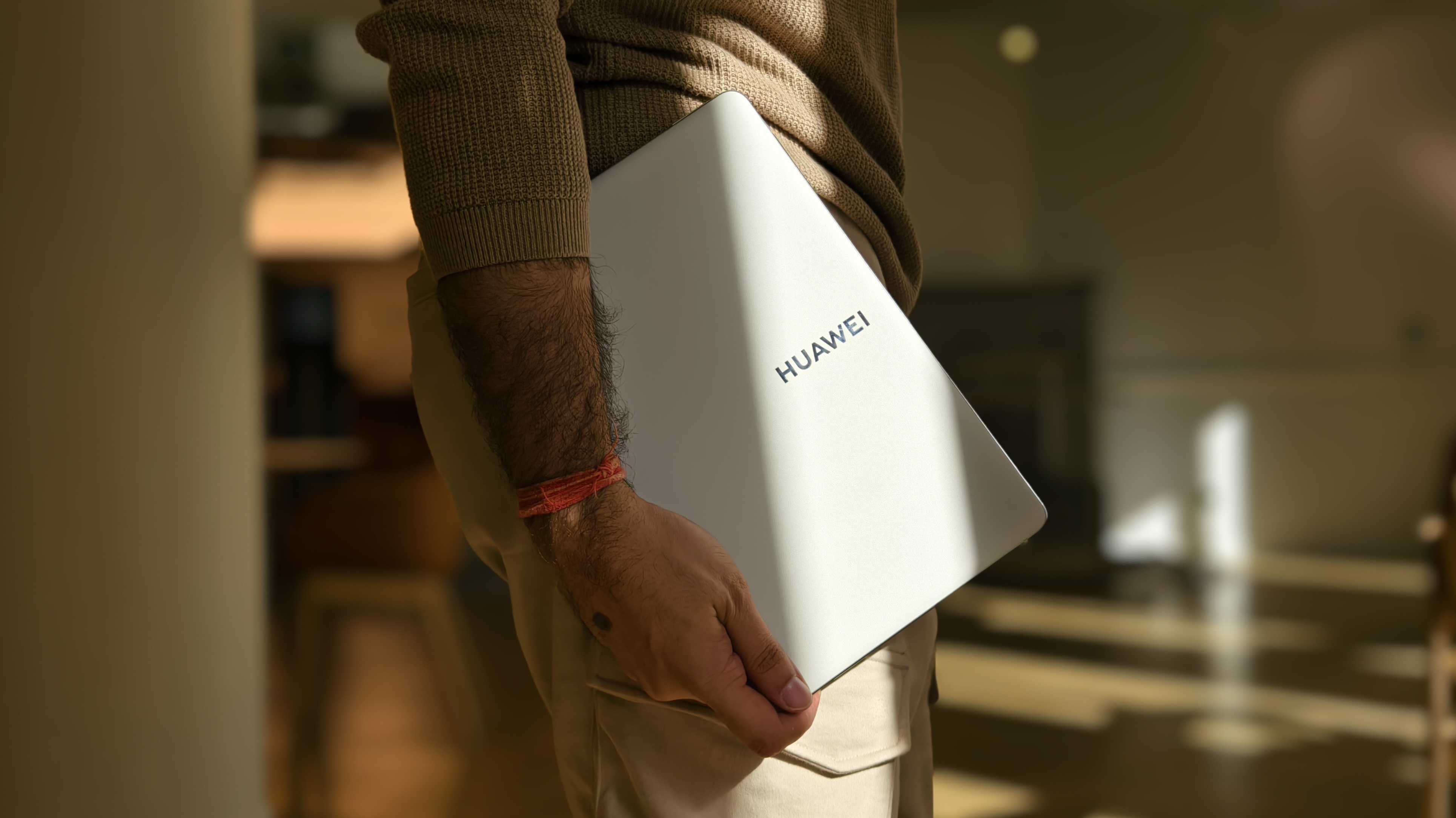 Prakhar Khanna holding the Huawei MateBook Fold.