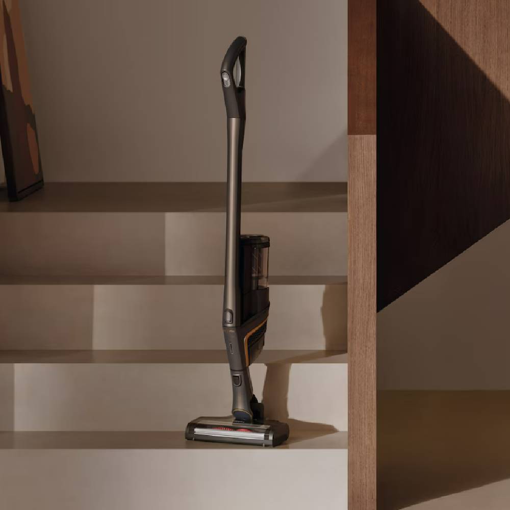 A Miele vacuum on a staircase.