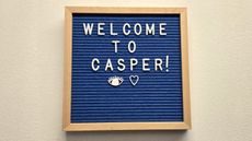 A "Welcome to Casper!" sign greets our sleep writer as she visits Casper Labs in Brooklyn.
