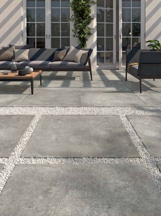 modern paving ideas: porcelain superstore slabs with gravel