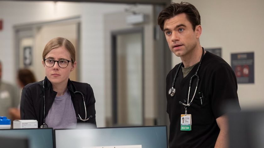 From left to right: Mel and Langdon standing next to each other on The Pitt. 