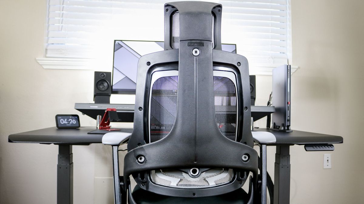 The Uplift Pursuit office chair pushed into a desk