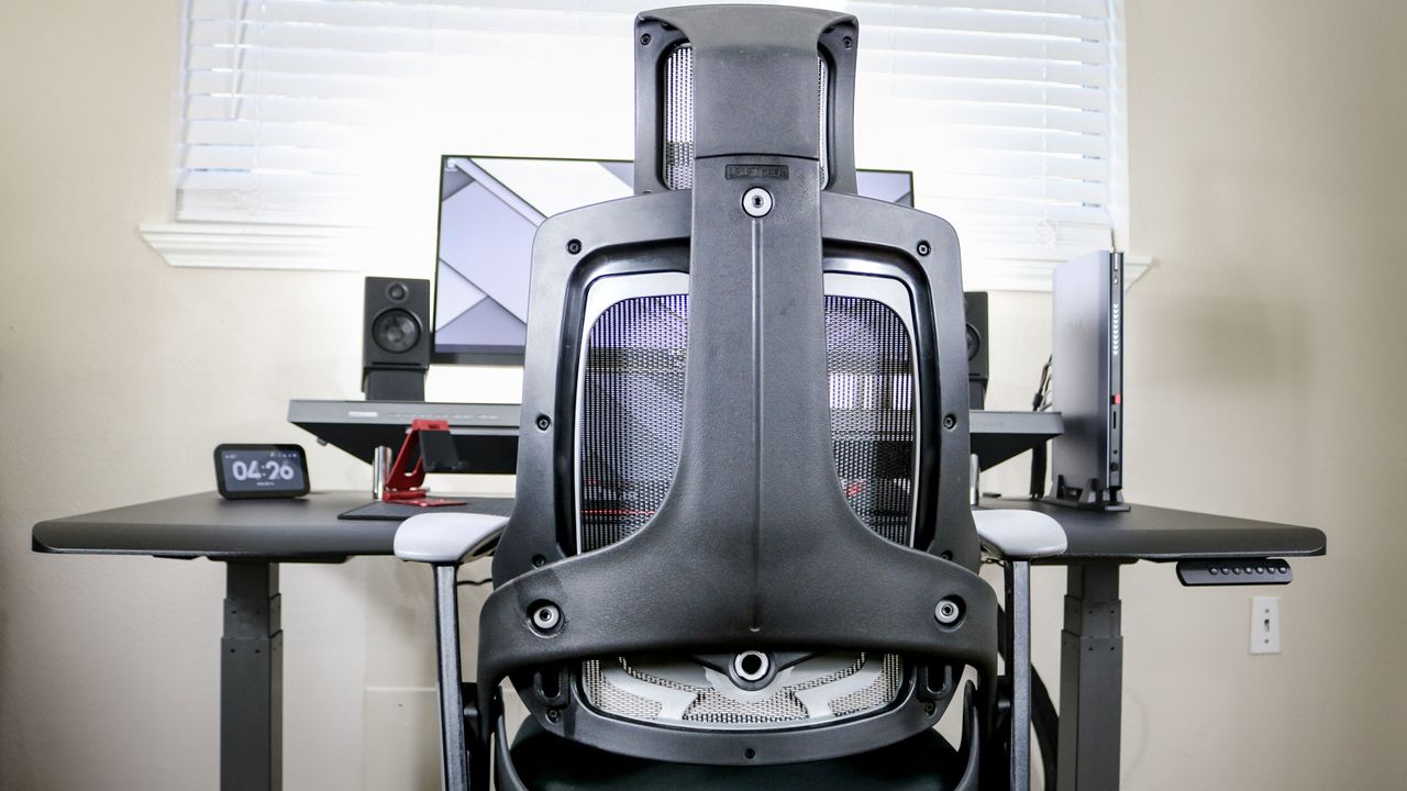 The Uplift Pursuit office chair pushed into a desk