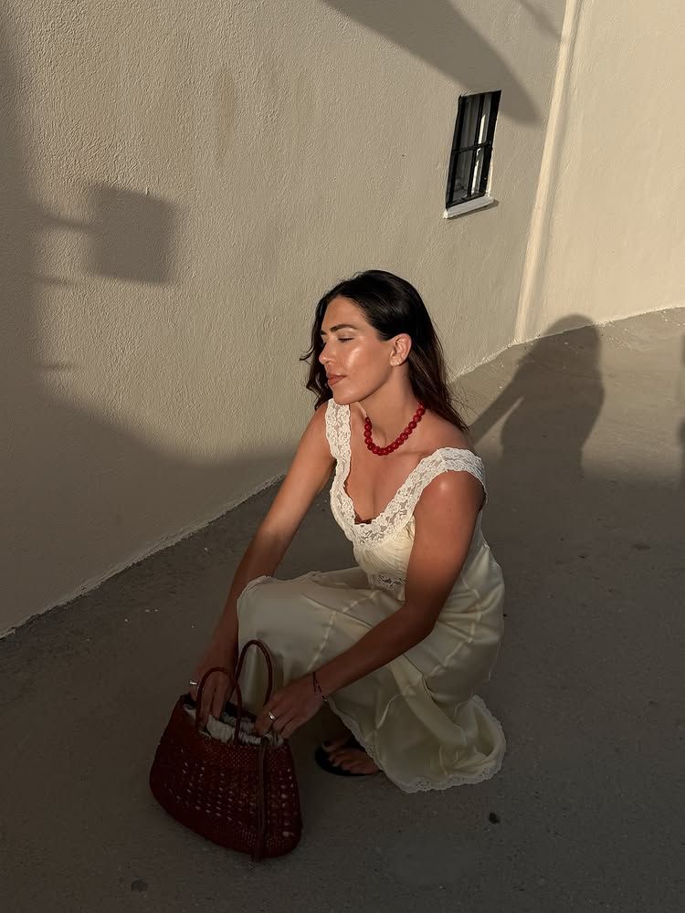 An image of @_jessicaskye wearing one of the key summer dresses for summer.