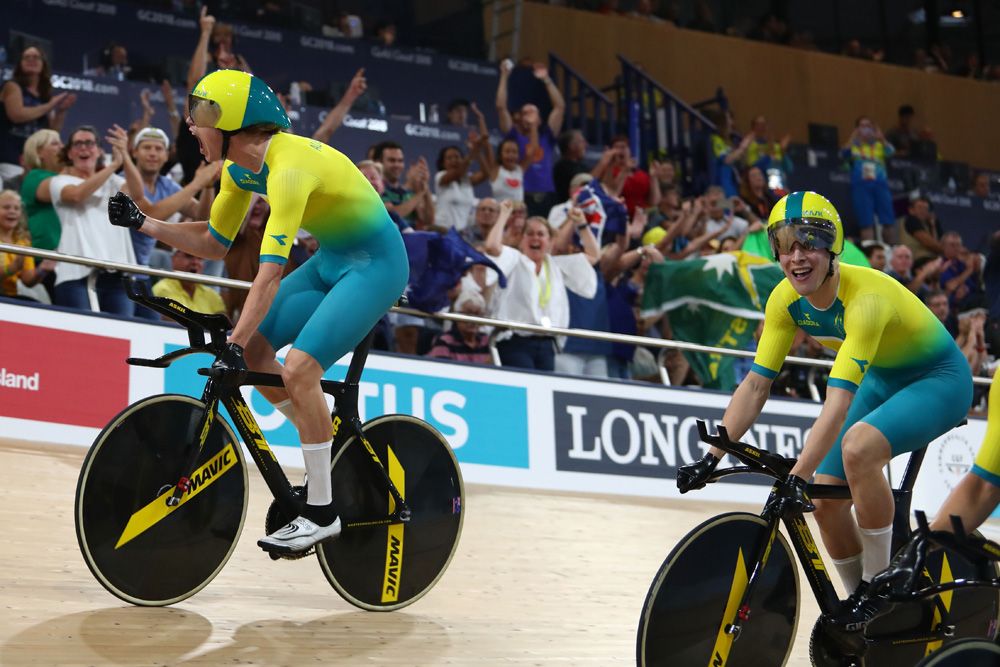 The Gold Coast velodrome goes wild after Australia sets a new men's team pursuit record