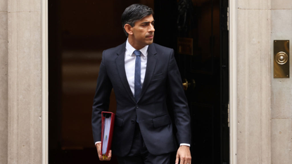 Rishi Sunak walks out of No. 10 Dowing Street