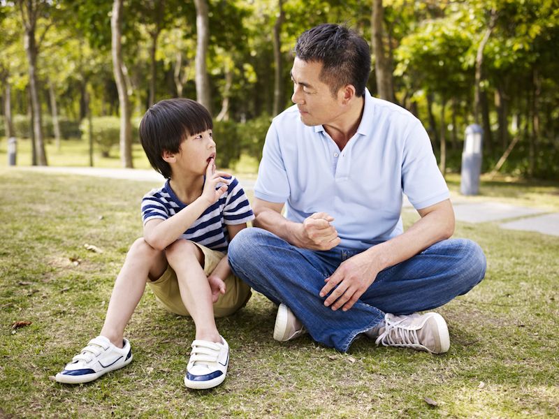 Father talking with son