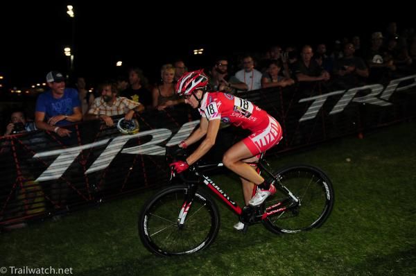 Lea Davison (Specialized) descending one of the grassy hills
