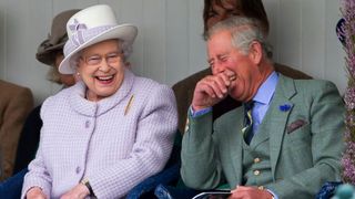 Queen Elizabeth II and King Charles laughing