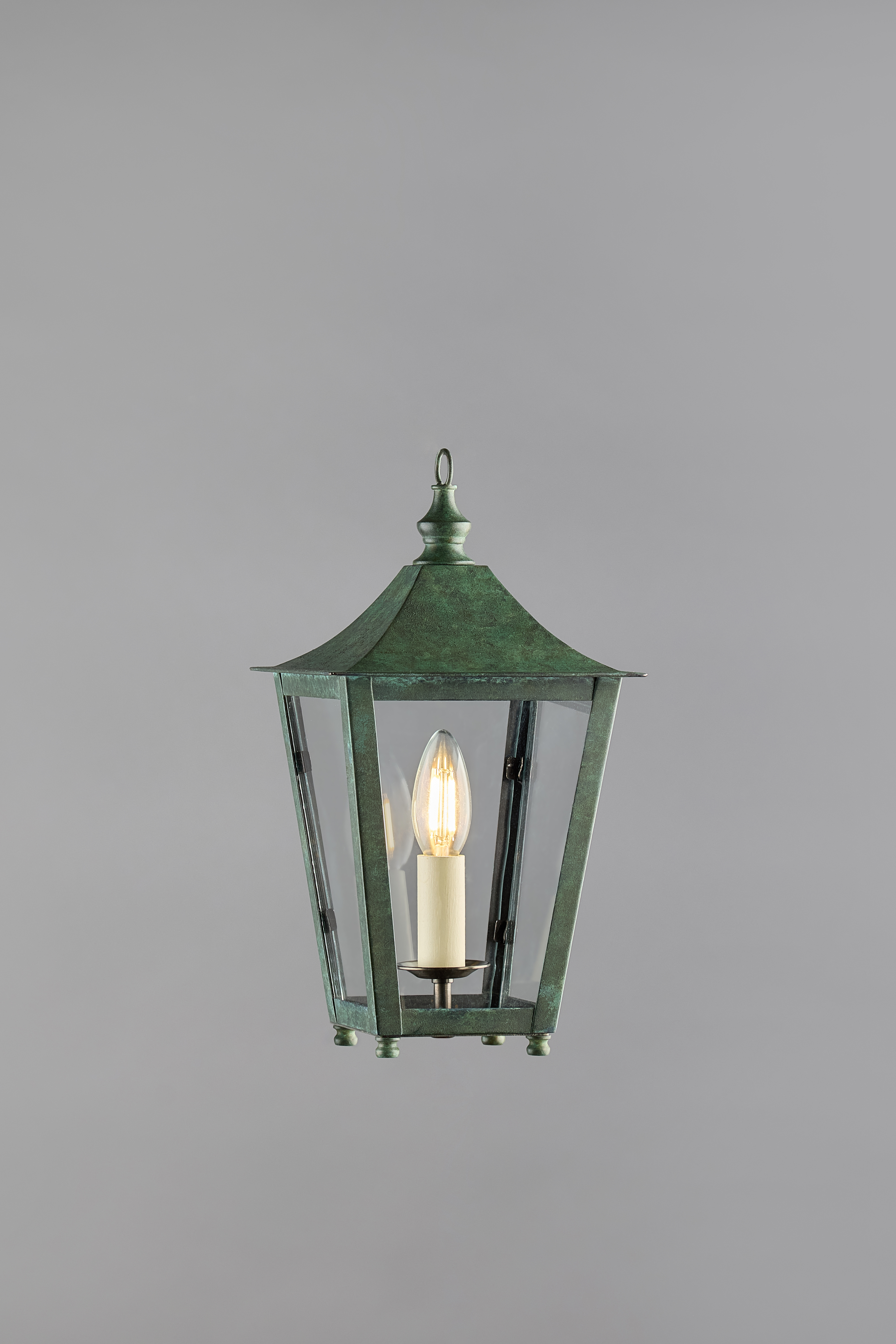 Verdigris lantern with a single bulb