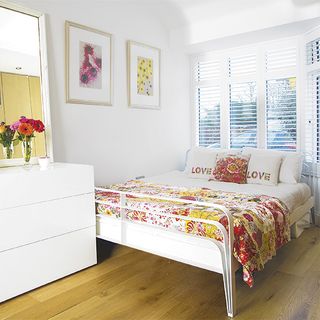 bedroom with bed and wooden flooring