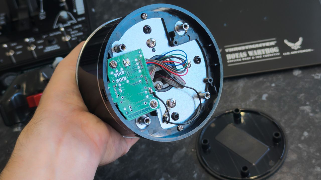 Thrustmaster HOTAS WARTHOG MK II flight stick base disassembled showing circuit board and wires