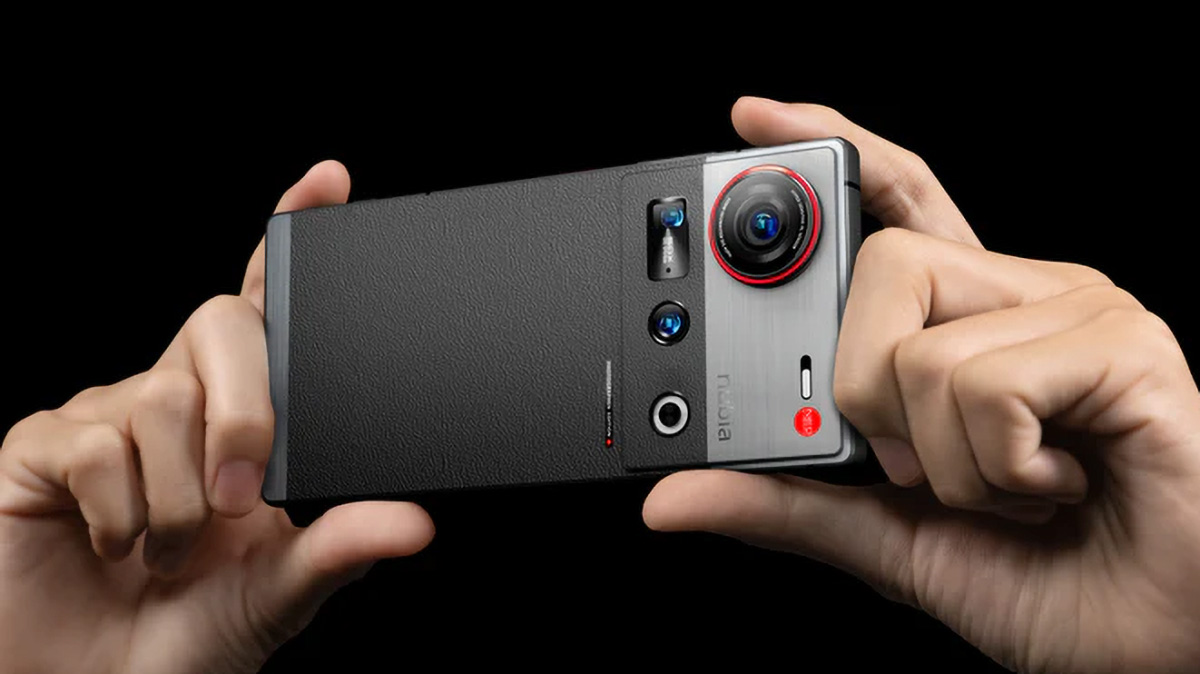 Nubia Z70S Ultra smartphone in the hand, studio lighting, black background