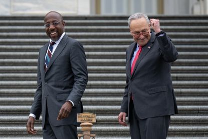  Sen. Warnock returns to the Capitol, where Sen. Schumer celebrates his victory.