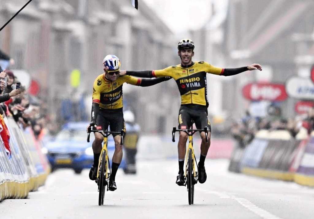 Belgian Wout van Aert of Team JumboVisma and French Christophe Laporte of JumboVisma celebrate after winning the mens GentWevelgem In Flanders Fields cycling race 2609 km from Ieper to Wevelgem Sunday 26 March 2023 BELGA PHOTO JASPER JACOBS Photo by JASPER JACOBS BELGA MAG Belga via AFP Photo by JASPER JACOBSBELGA MAGAFP via Getty Images