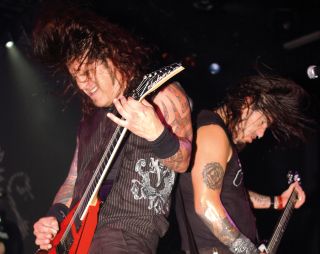 Phil Demmel and Robb Flynn trade riffs at Nokia Theatre Times Square, New York City, in 2007