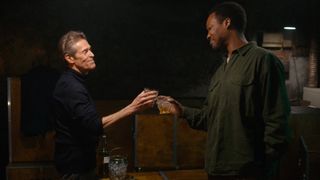 Willem Dafoe and Corey Hawkins in The Man in the Basement