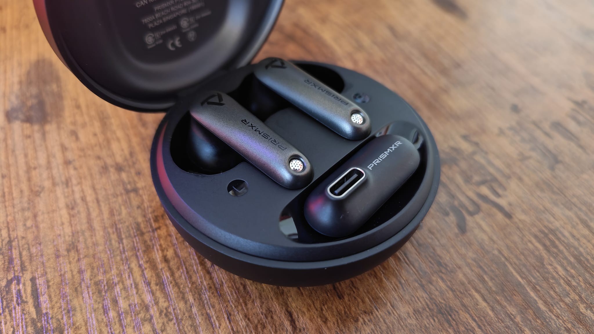 A closer look at the PrismXR Vega T1 earbuds in their case