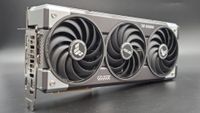 The Asus TUF Gaming RTX 5070 Ti OC Edition in 3/4 profile on a silver background